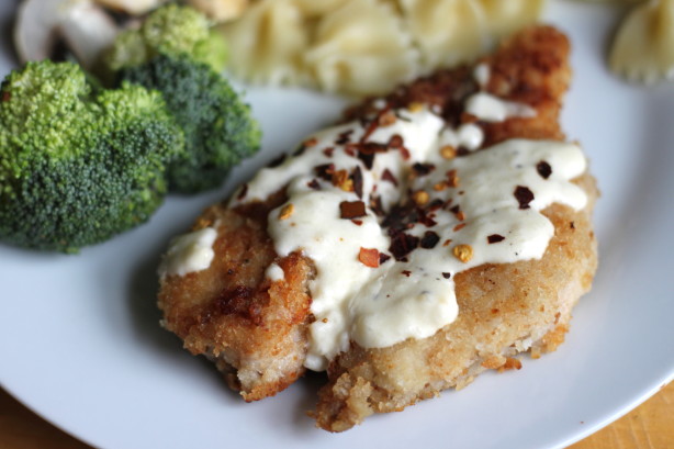 Chicken Parmigiana The Gluten Sensitive Grilled Chicken Parmigiana is topped with marinara sauce and Italian cheeses served with a side of gluten-free rotini marinara.